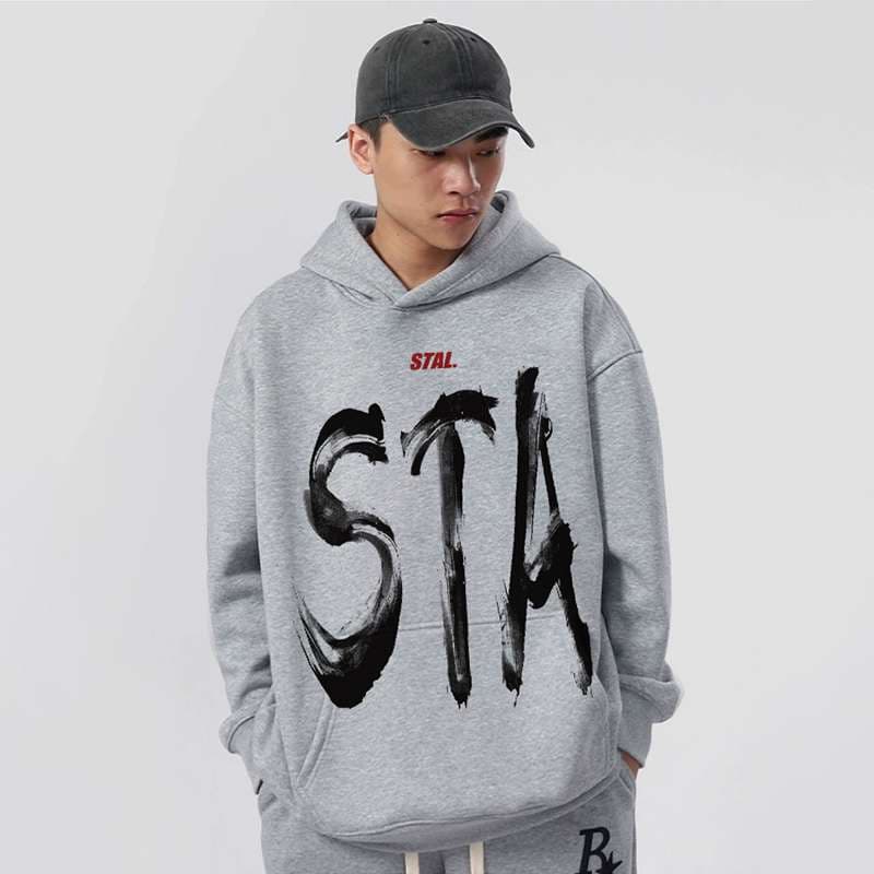 アメカジ スタイリッシュブラシストローク文字パーカー